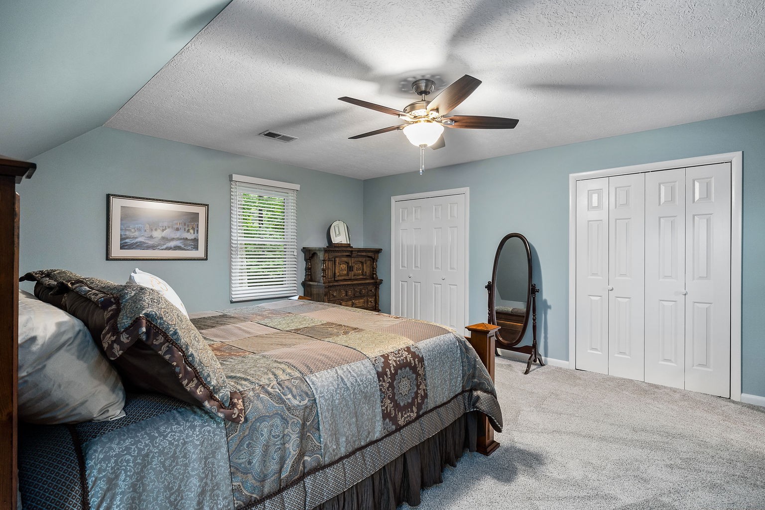 715 Old Rock Island Road Rock Island, TN 38581 - Photo 24 of 48 a bedroom with a bed and a chandelier