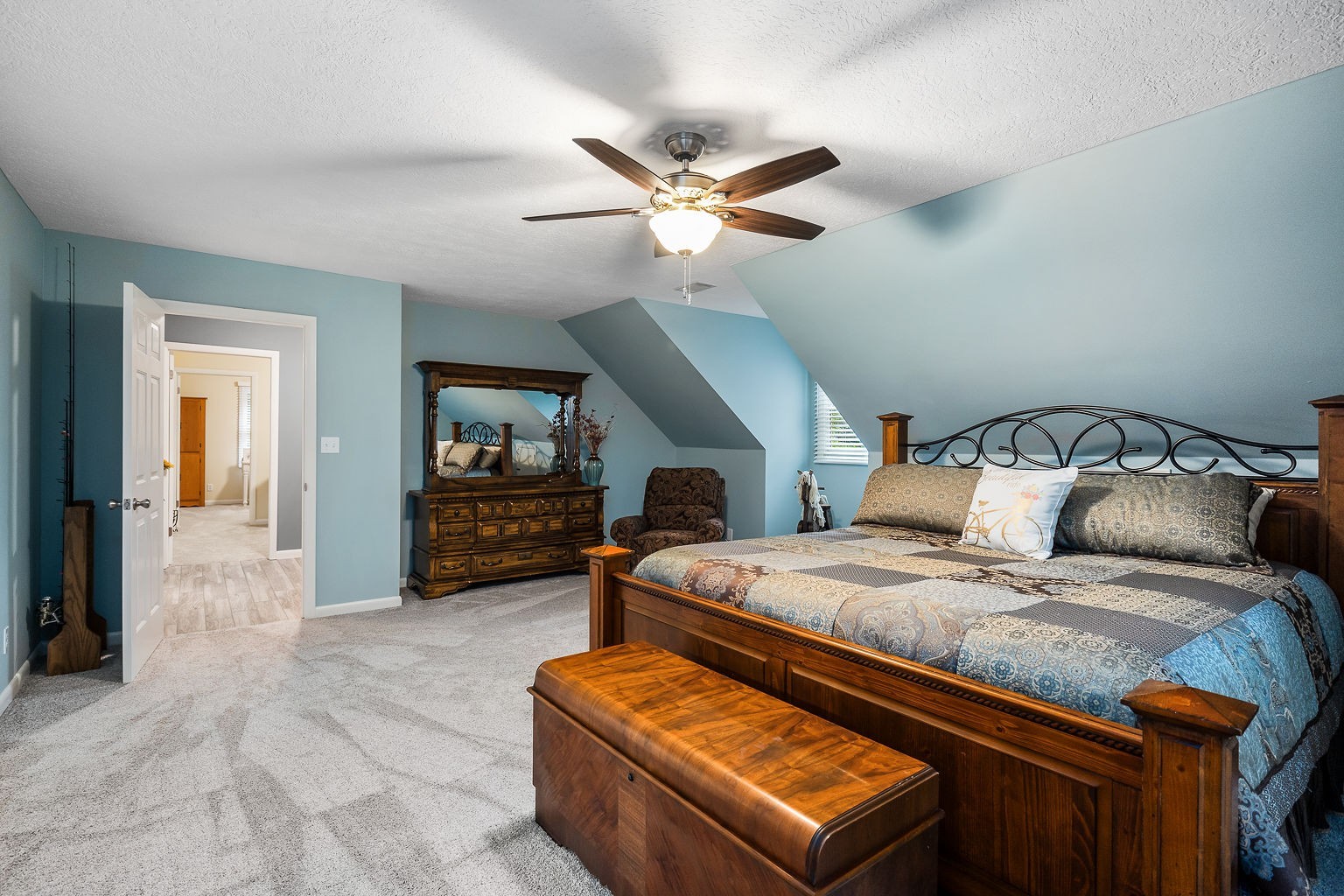 715 Old Rock Island Road Rock Island, TN 38581 - Photo 25 of 48 a bedroom with a bed and a chandelier