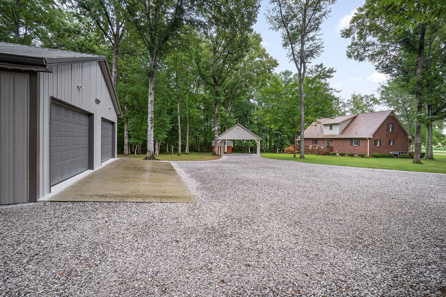 715 Old Rock Island Road Rock Island, TN 38581 - Photo 39 of 48 a view of large house with large trees and outdoor space