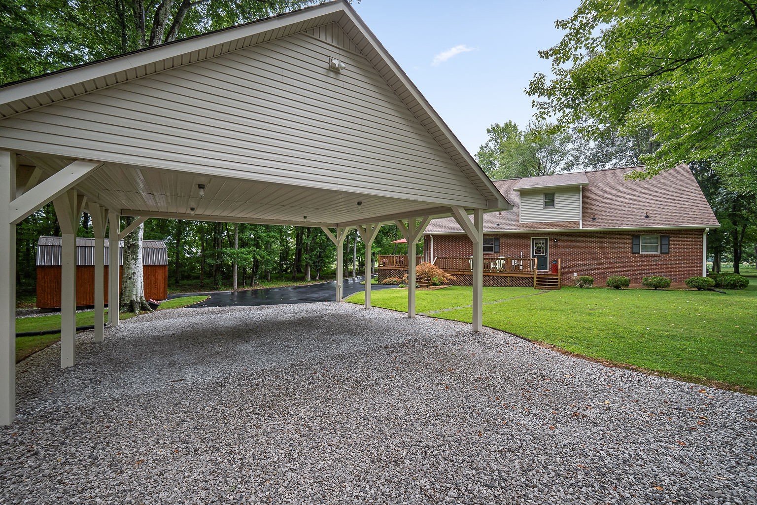 715 Old Rock Island Road Rock Island, TN 38581 - Photo 40 of 48 a view of a house with a yard and plants