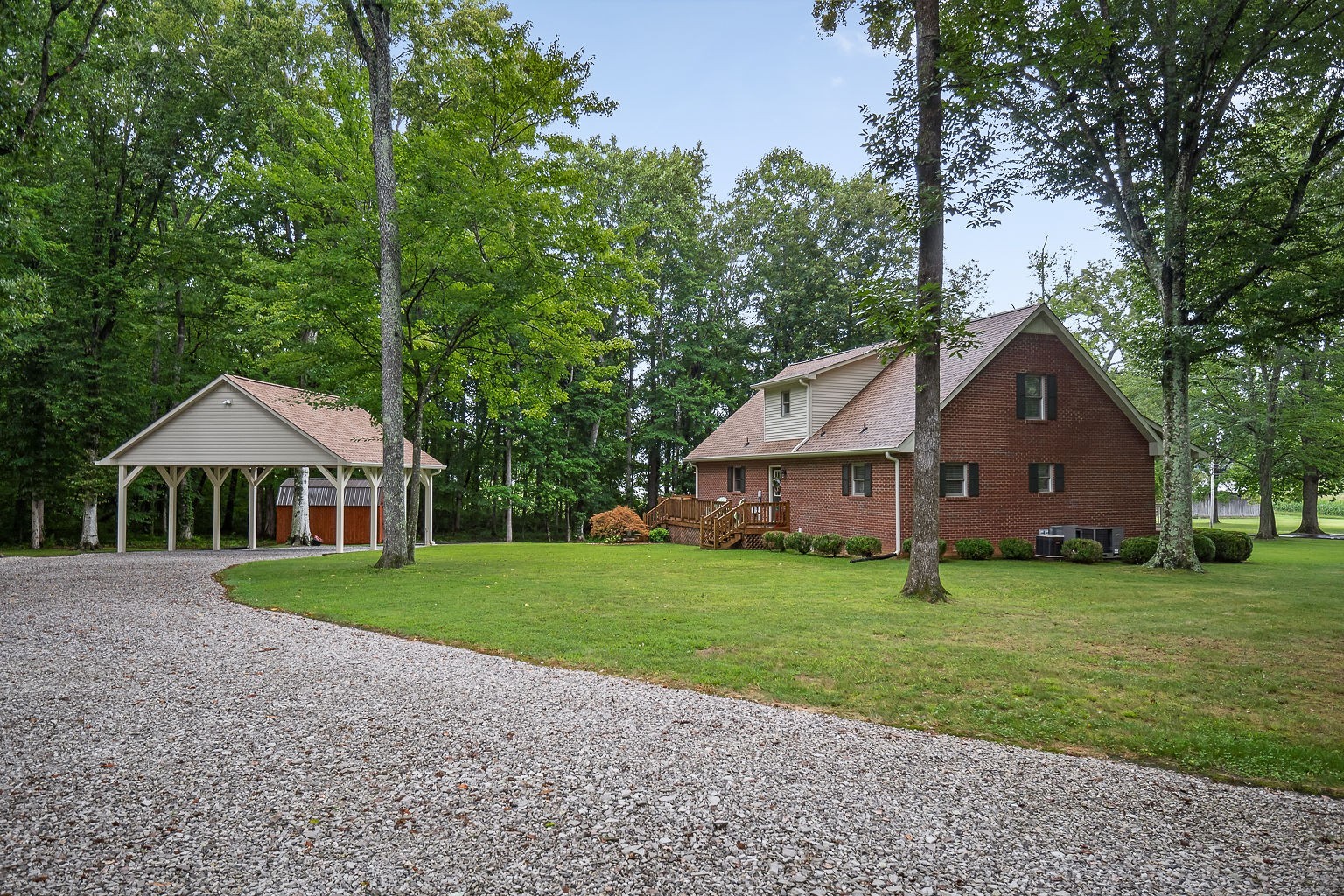 715 Old Rock Island Road Rock Island, TN 38581 - Photo 42 of 48 a front of a house with a garden