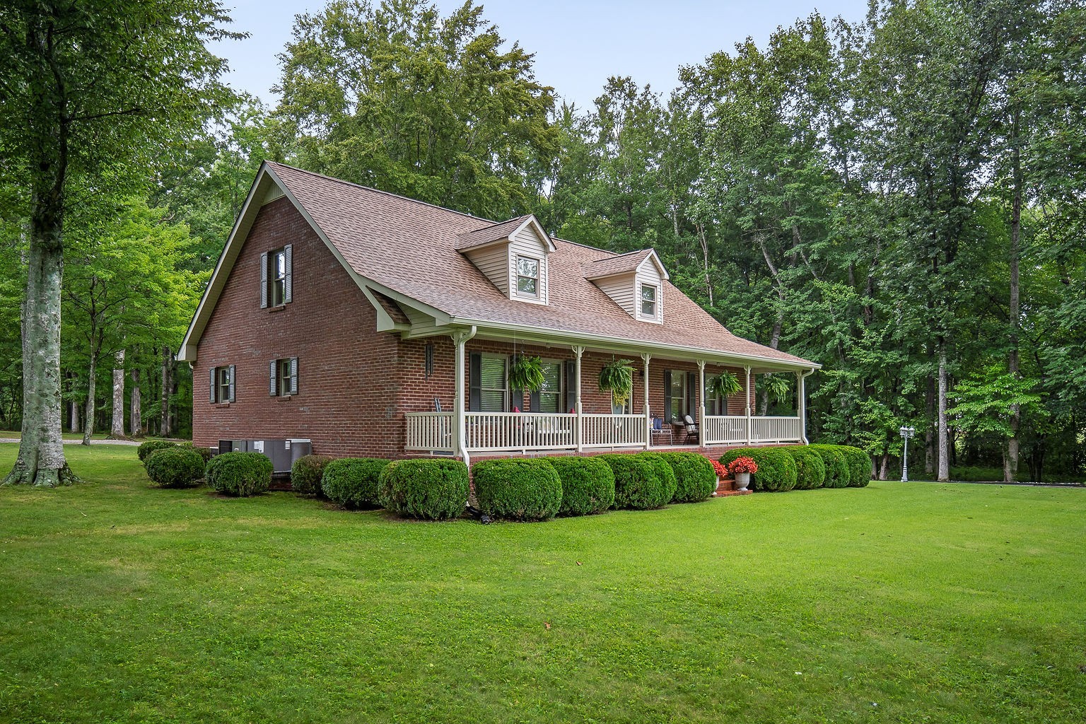 715 Old Rock Island Road Rock Island, TN 38581 - Photo 44 of 48 a front view of a house with garden