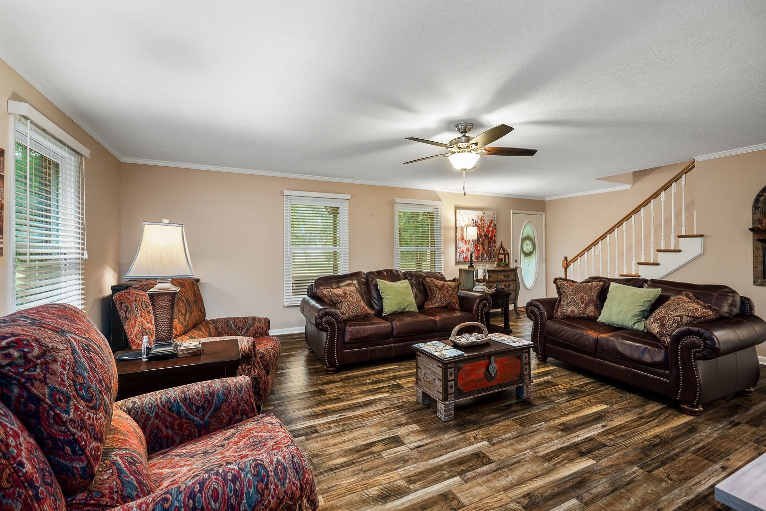 715 Old Rock Island Road Rock Island, TN 38581 - Photo 5 of 48 a living room with furniture a ceiling fan a lamp and a window