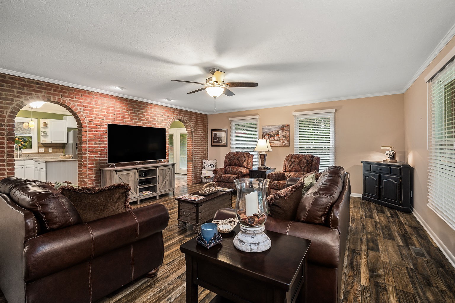 715 Old Rock Island Road Rock Island, TN 38581 - Photo 6 of 48 a living room with furniture a flat screen tv and a large window