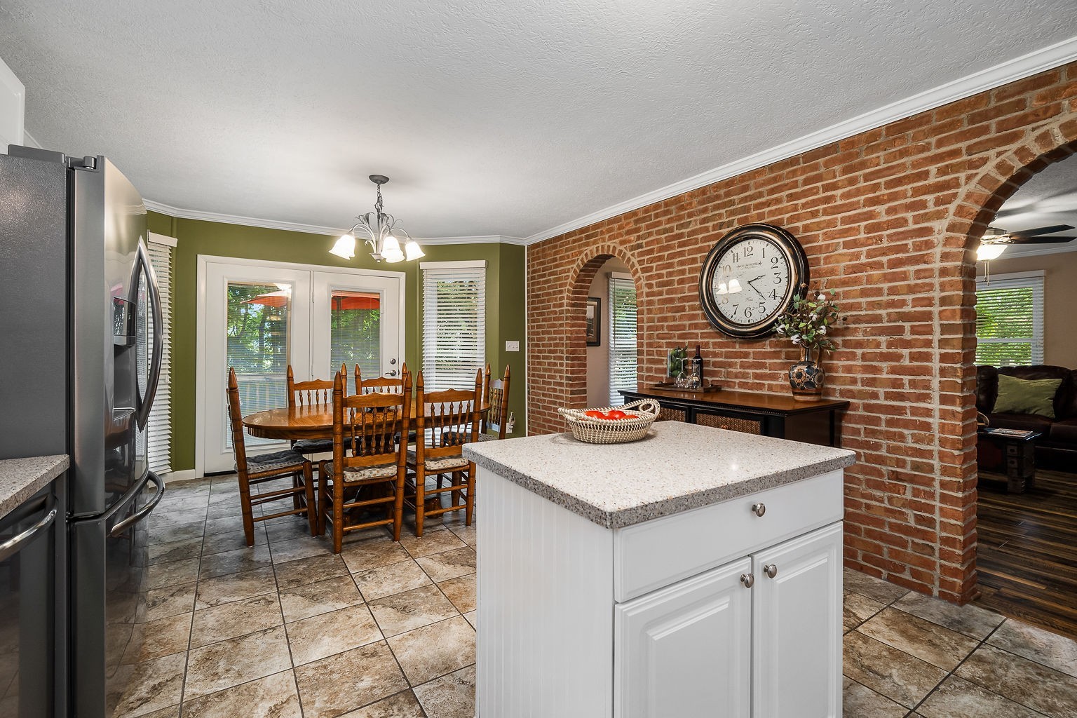 715 Old Rock Island Road Rock Island, TN 38581 - Photo 10 of 48 a view of kitchen island with granite countertop furniture and a clock