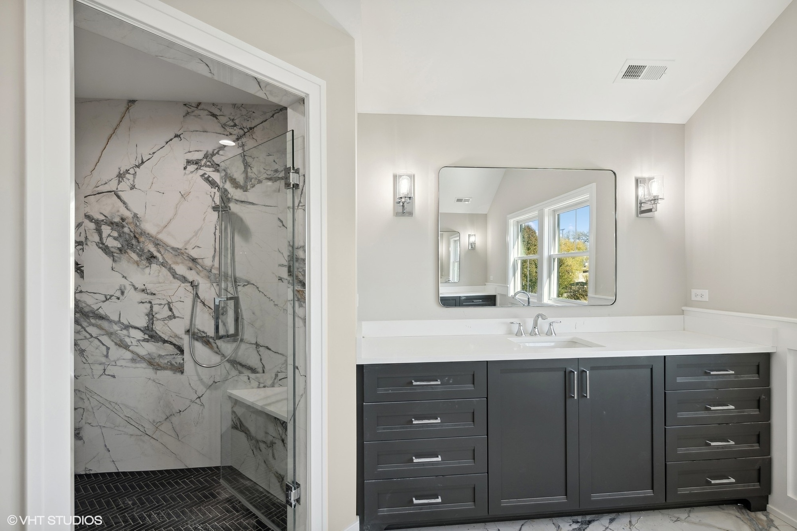 648 Saylor Avenue Elmhurst, IL 60126 - Photo 19 of 27 a bathroom with a granite countertop sink a toilet and a mirror