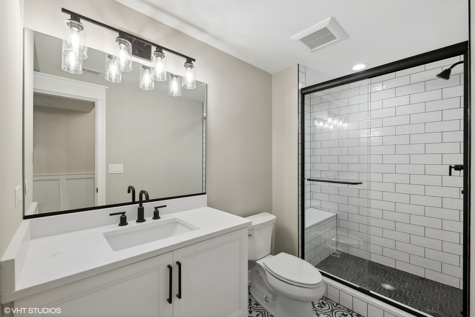 648 Saylor Avenue Elmhurst, IL 60126 - Photo 21 of 27 a bathroom with a sink a toilet and shower