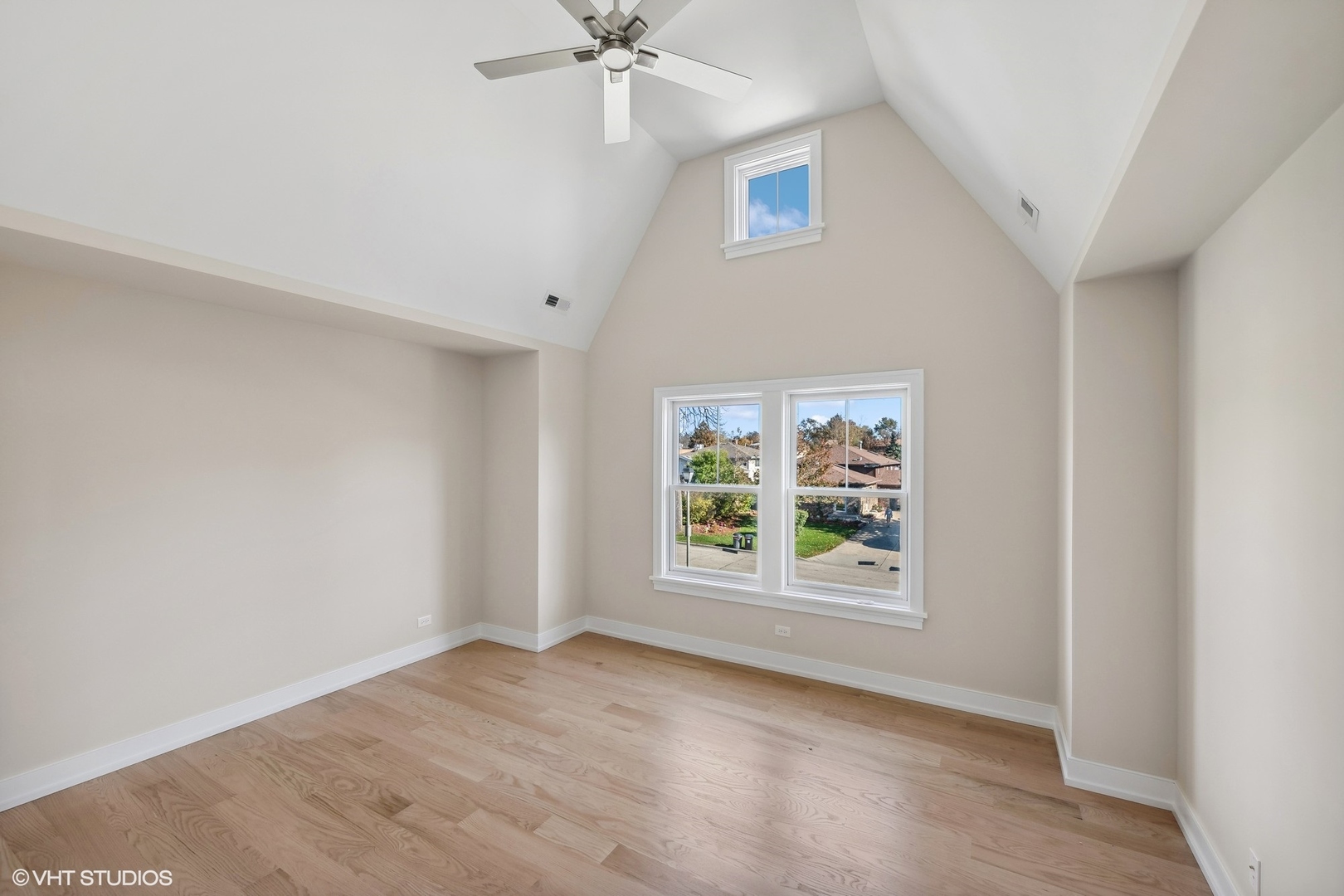 648 Saylor Avenue Elmhurst, IL 60126 - Photo 23 of 27 an empty room with windows and fan