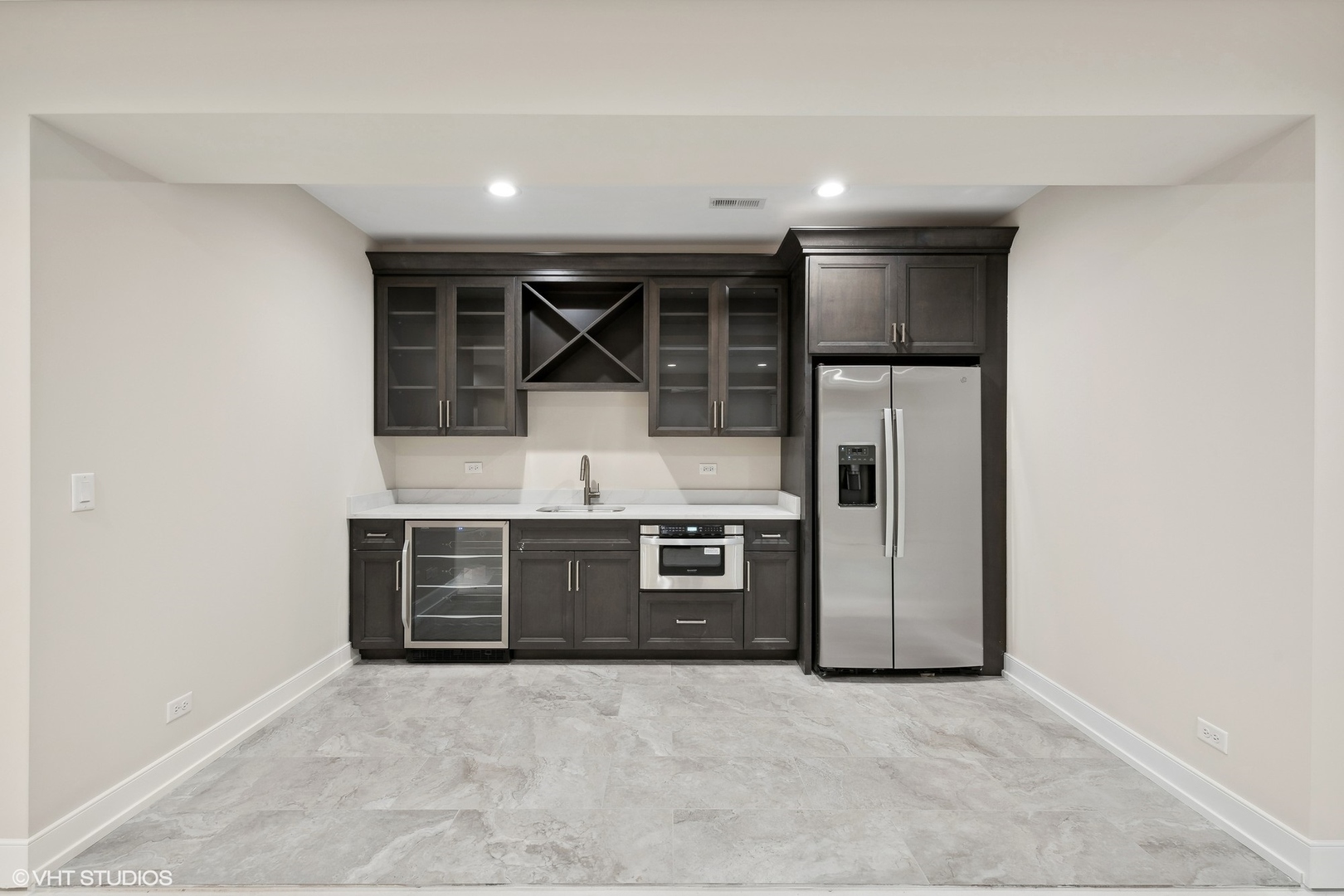 648 Saylor Avenue Elmhurst, IL 60126 - Photo 27 of 27 a view of an empty room with a kitchen