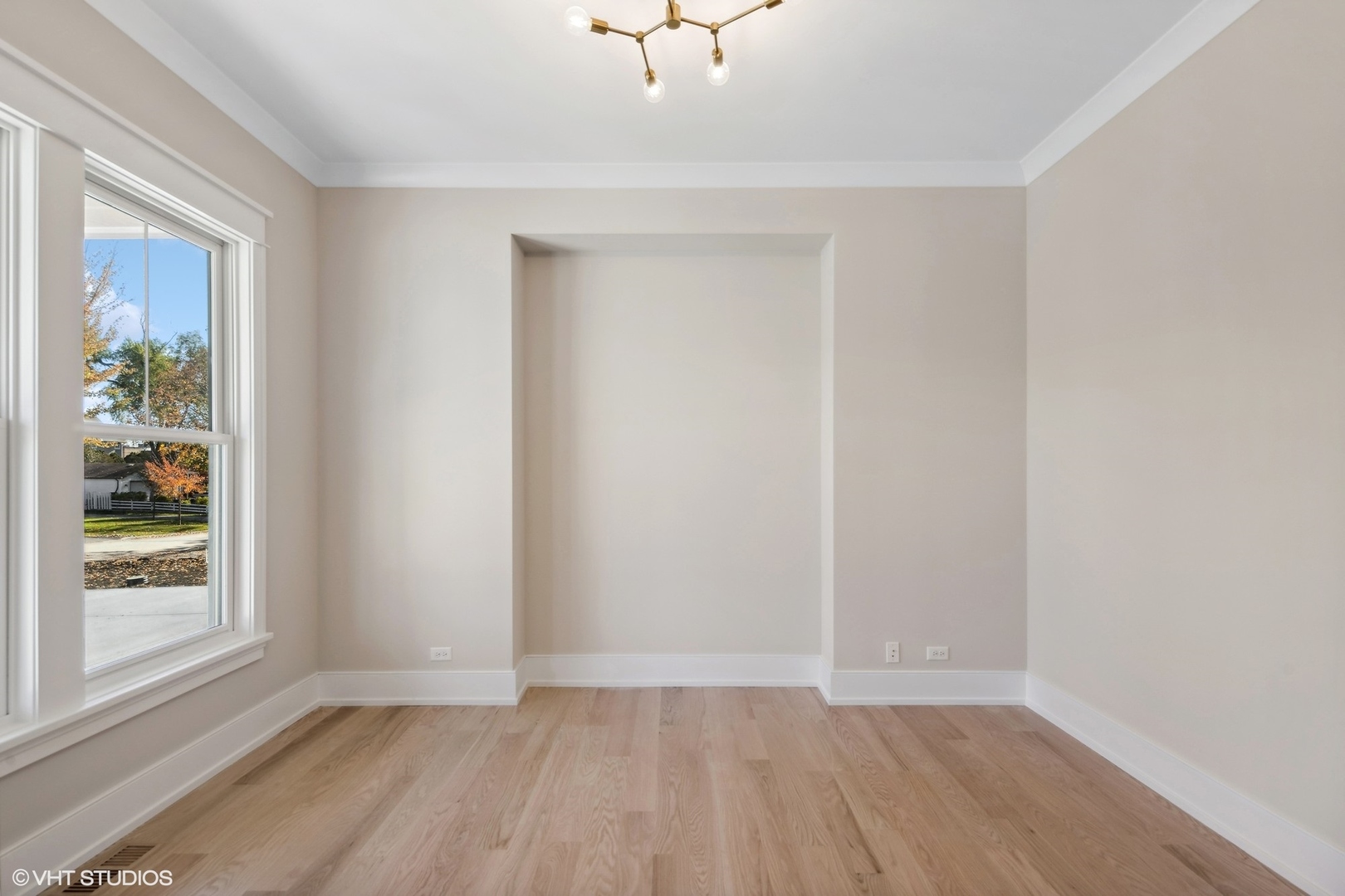 648 Saylor Avenue Elmhurst, IL 60126 - Photo 3 of 27 a view of an empty room with window and closet area