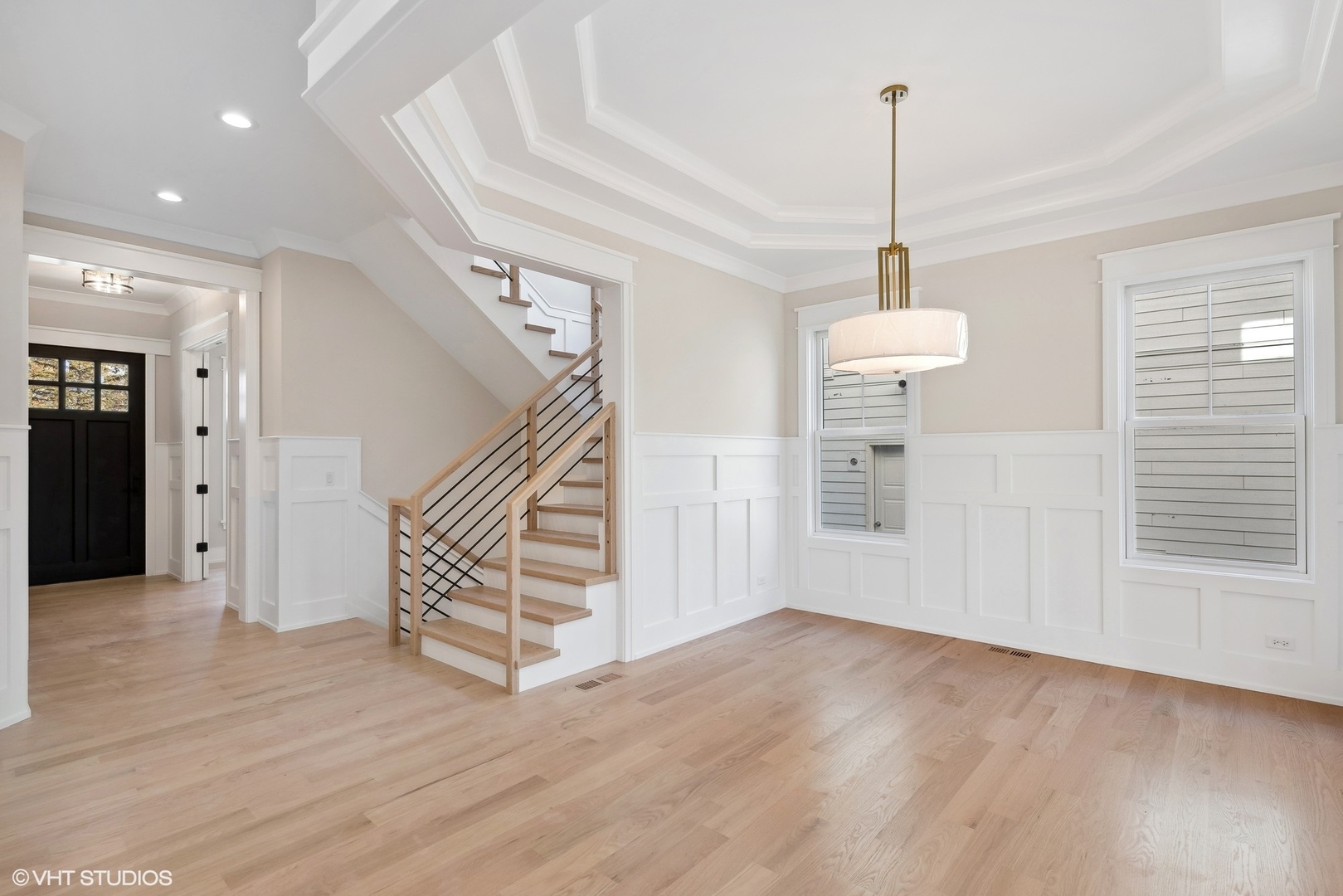 648 Saylor Avenue Elmhurst, IL 60126 - Photo 4 of 27 a view of empty room with wooden floor and fan