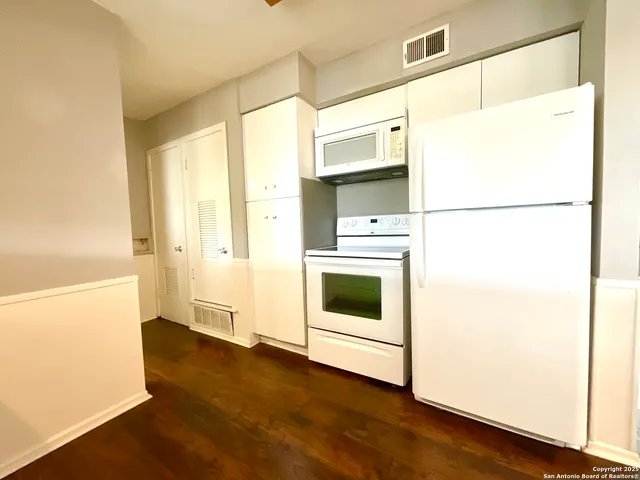 a utility room with washer and dryer