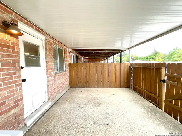 a view of backyard with green space