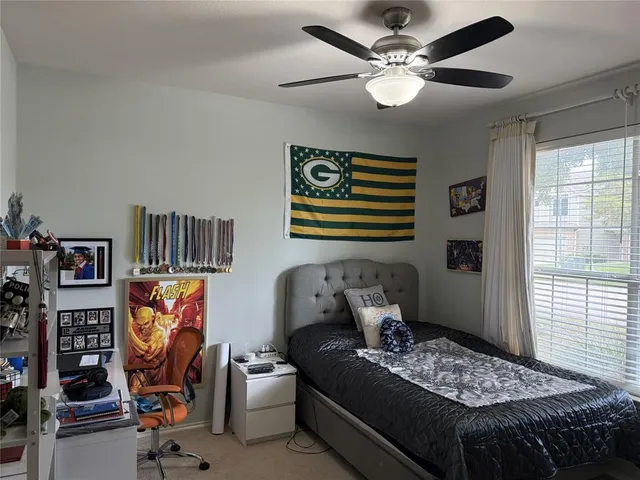 a bathroom with a sink toilet and a mirror