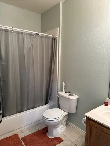 a backyard of a house with outdoor seating