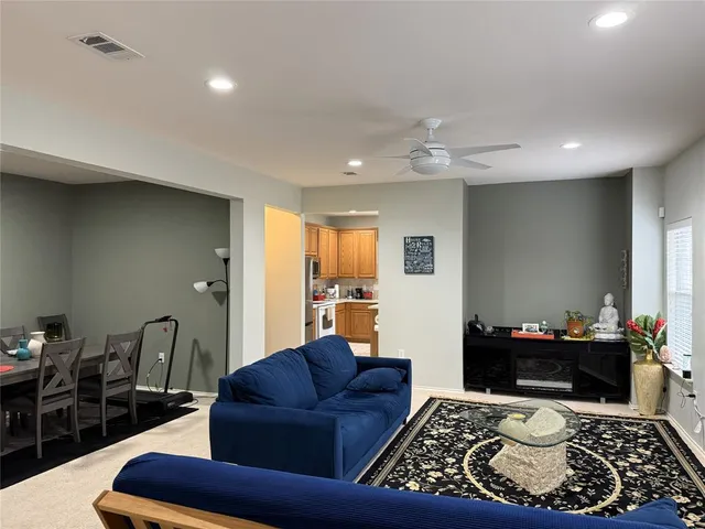 a living room with furniture and a couch