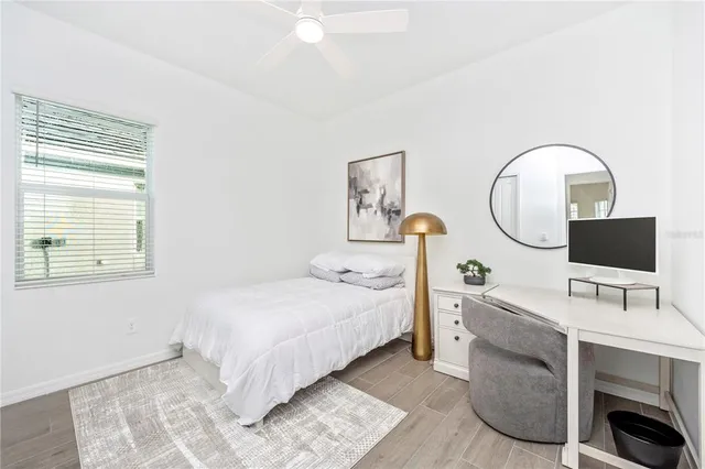 a view of a swimming pool with a yard