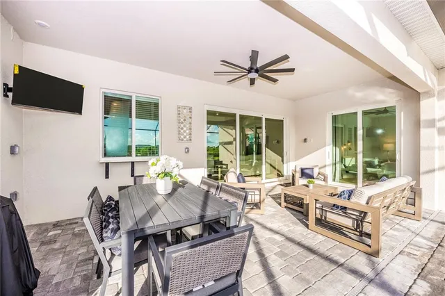 a view of a room with gym equipment and a large window