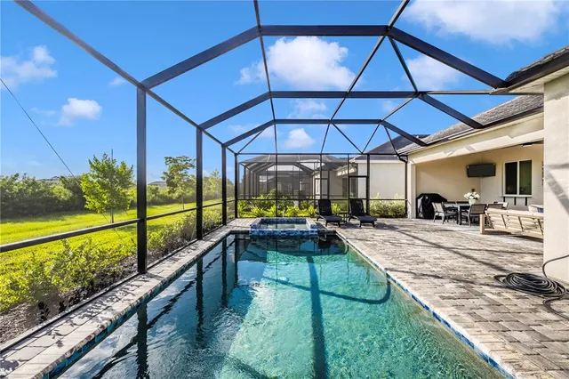 a view of a golf course with an ocean