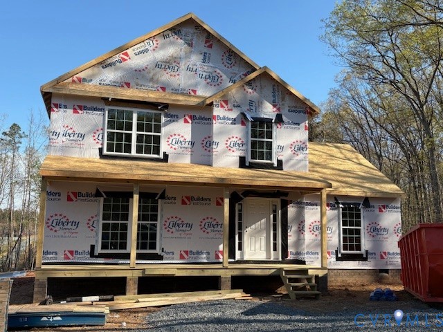2570 Doctors Road Louisa, VA 23093 - Photo 1 of 17 front view of a building with a lots of windows