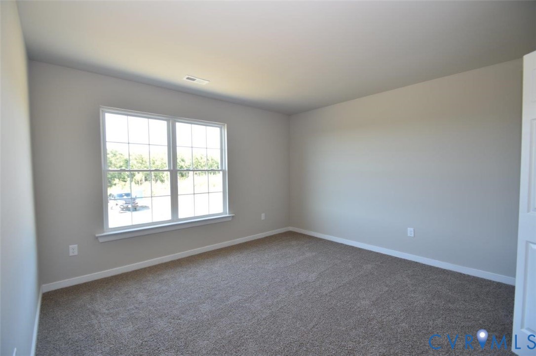 2570 Doctors Road Louisa, VA 23093 - Photo 16 of 17 an empty room with a window