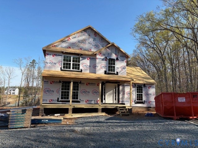 2570 Doctors Road Louisa, VA 23093 - Photo 2 of 17 a front view of a house with a garden