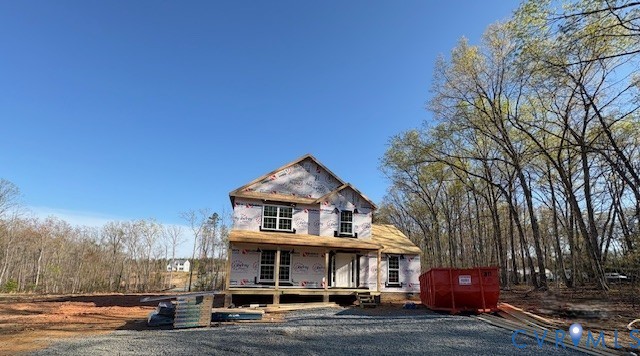 2570 Doctors Road Louisa, VA 23093 - Photo 3 of 17 a front view of a building with trees