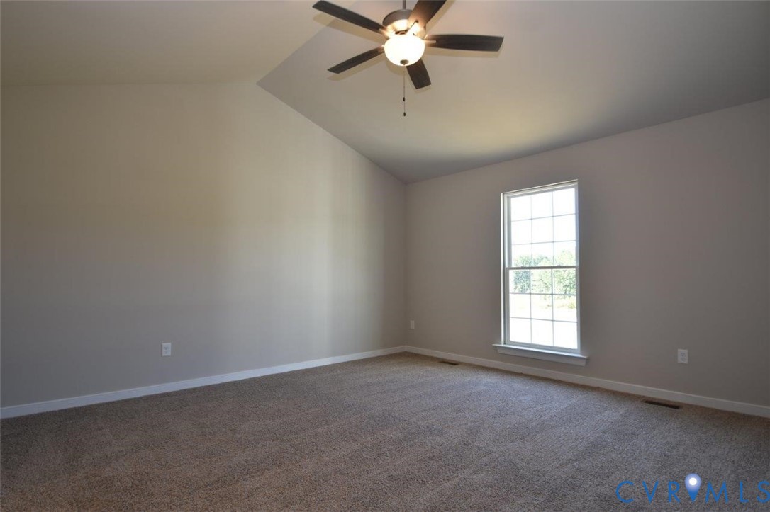 2570 Doctors Road Louisa, VA 23093 - Photo 4 of 17 an empty room with a window and a fan