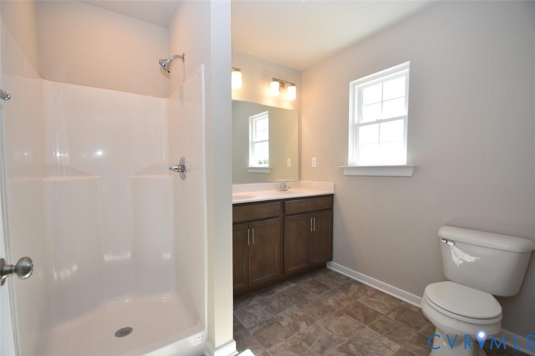 2570 Doctors Road Louisa, VA 23093 - Photo 6 of 17 a bathroom with a sink toilet and shower