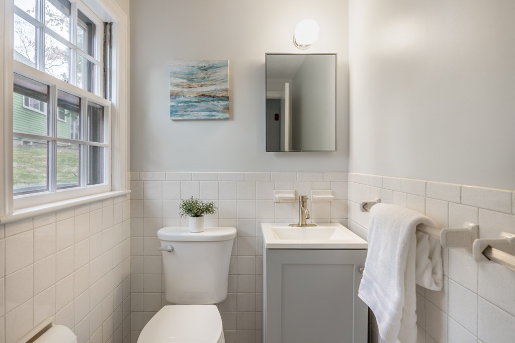 11 Kendall Road Lexington, MA 02421 - Photo 15 of 30 a bathroom with a sink mirror and toilet