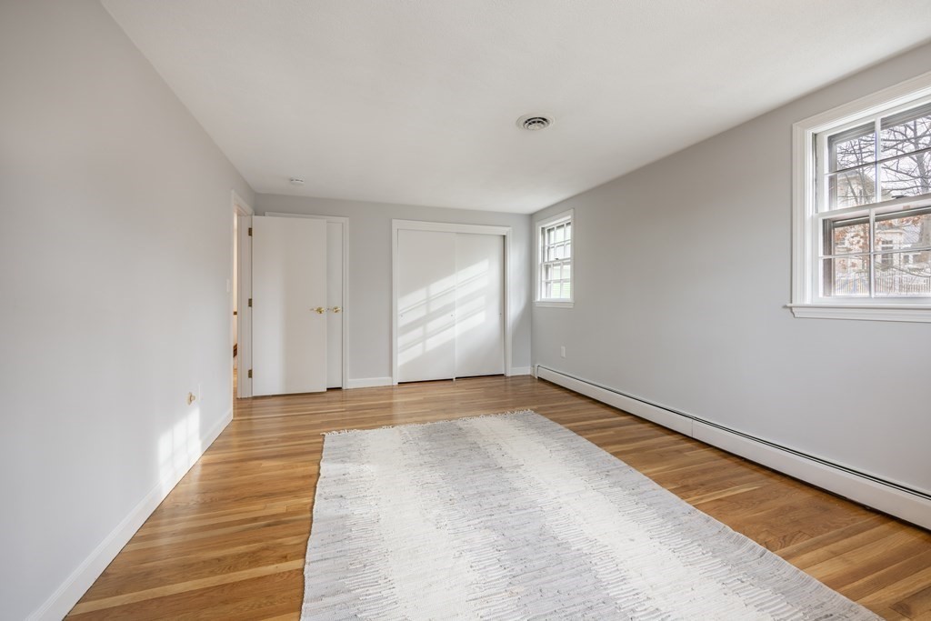 11 Kendall Road Lexington, MA 02421 - Photo 21 of 30 a view of an empty room with a window