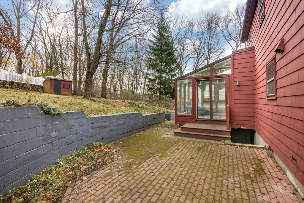 11 Kendall Road Lexington, MA 02421 - Photo 23 of 30 a view of a backyard with trees