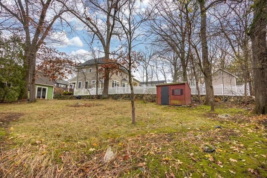 11 Kendall Road Lexington, MA 02421 - Photo 27 of 30 a house with trees in front of it