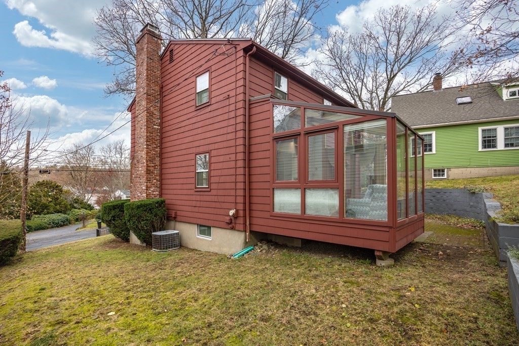 11 Kendall Road Lexington, MA 02421 - Photo 28 of 30 a backyard of a house with barbeque oven