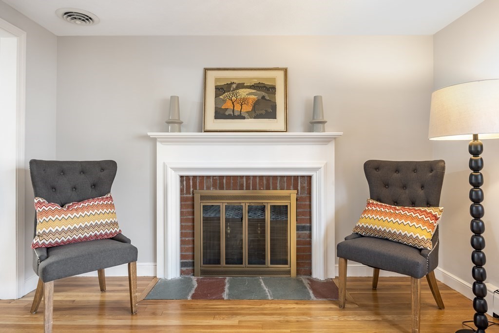 11 Kendall Road Lexington, MA 02421 - Photo 5 of 30 a living room with furniture and a fireplace