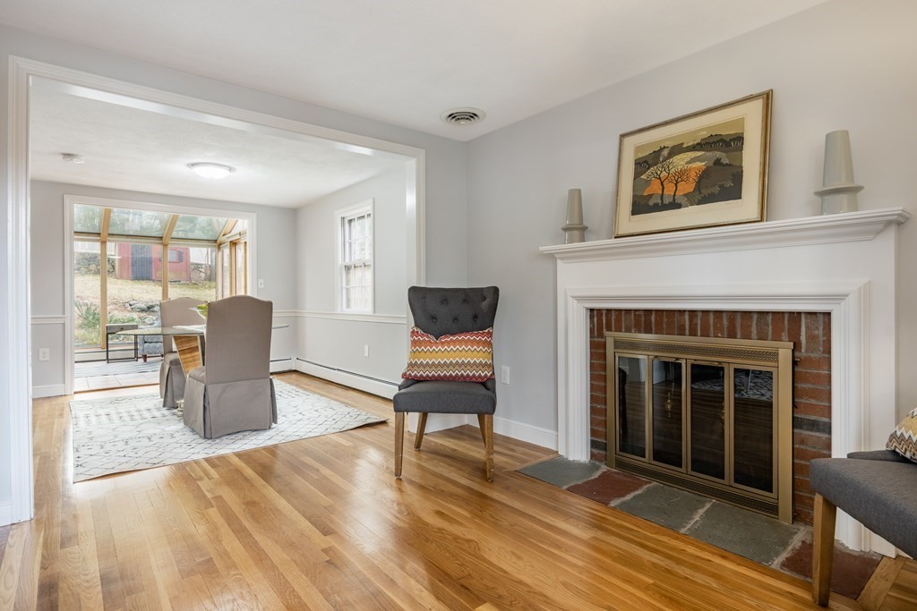 11 Kendall Road Lexington, MA 02421 - Photo 8 of 30 a living room with furniture and a fireplace