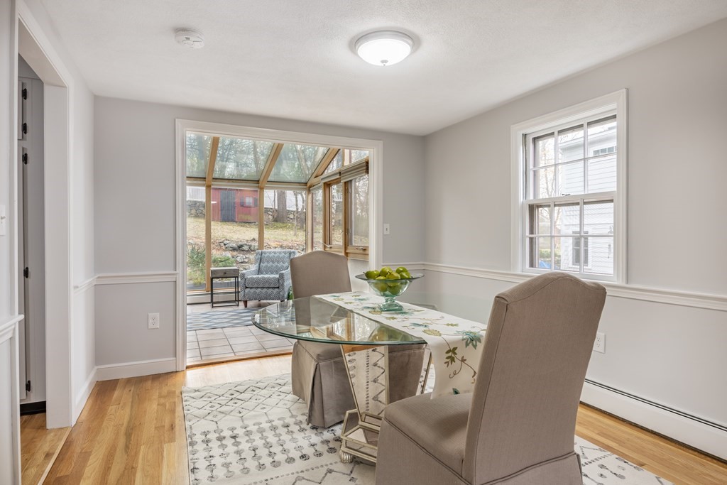 11 Kendall Road Lexington, MA 02421 - Photo 10 of 30 a view of a dining room with furniture wooden floor and a rug