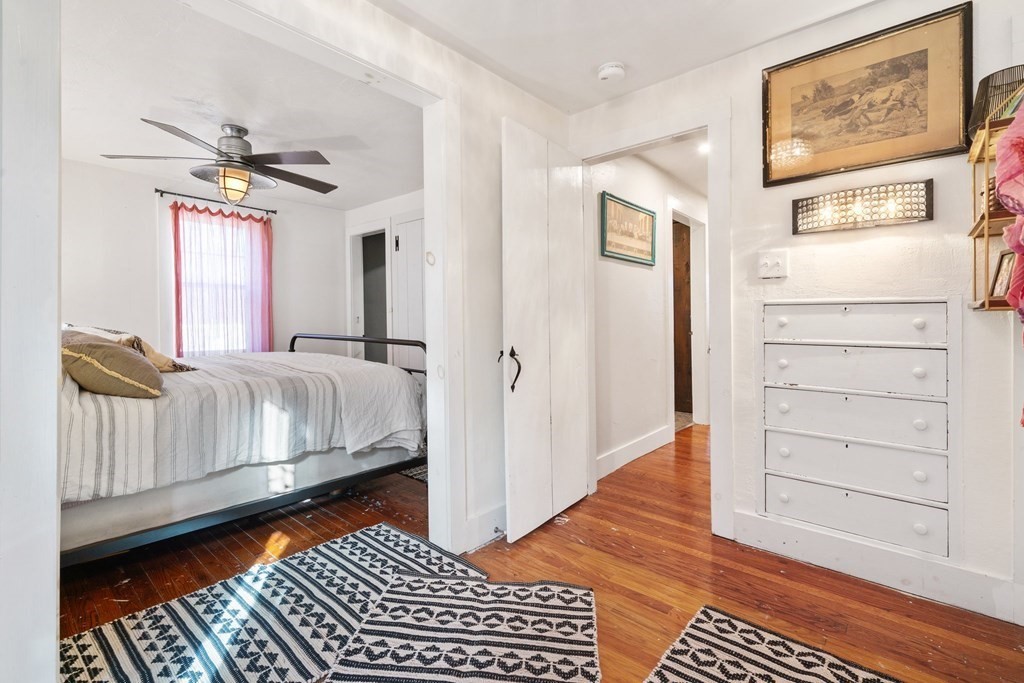 272 Harvard Road Bolton, MA 01740 - Photo 25 of 42 a bedroom with a bed and a window