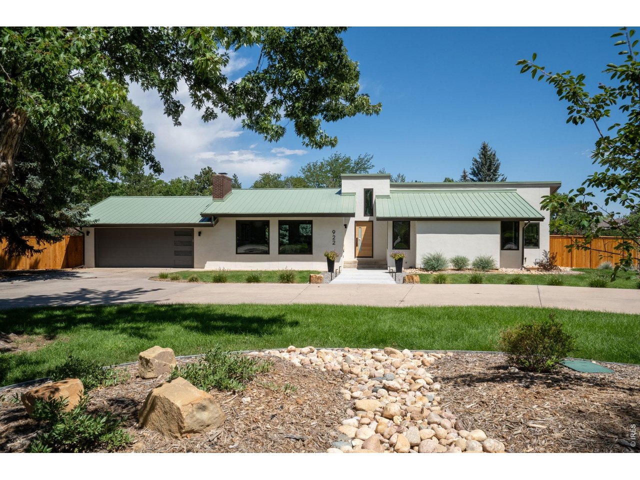 922 Club View Road Fort Collins, CO 80524 - Photo 2 of 50 24 gauge standing seam metal roof, new stucco, all new landscaping & irrigation & new Anderson composite windows!