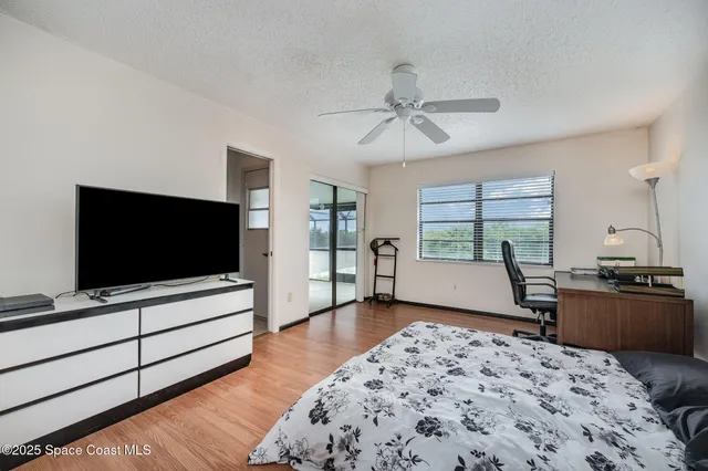 a bathroom with a toilet sink and shower