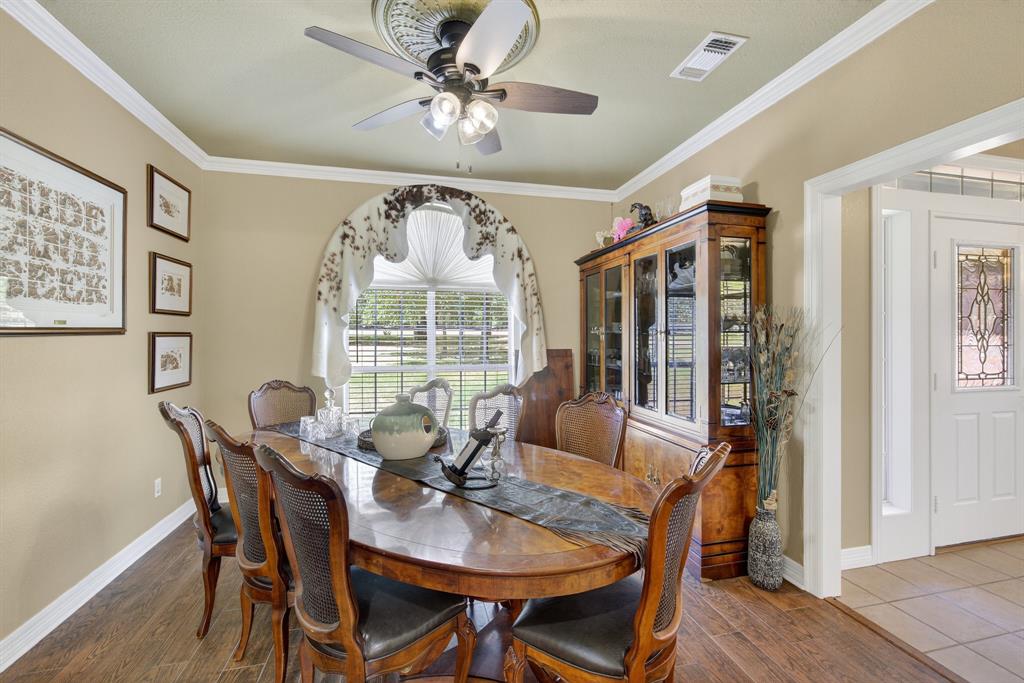482 Center Hill Road Gainesville, TX 76240 - Photo 11 of 38 a view of a dining room with furniture window and outside view