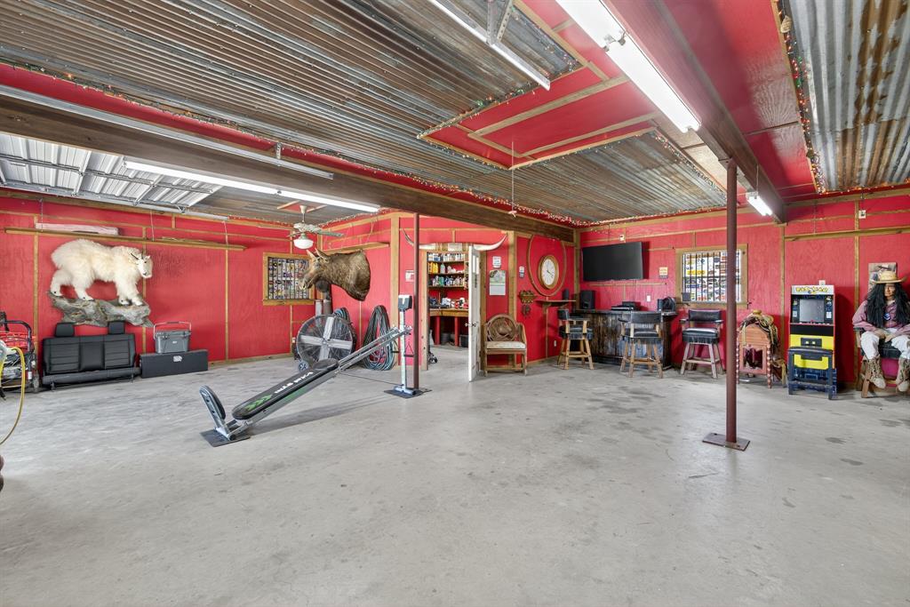 482 Center Hill Road Gainesville, TX 76240 - Photo 26 of 38 a view of a room with gym equipment