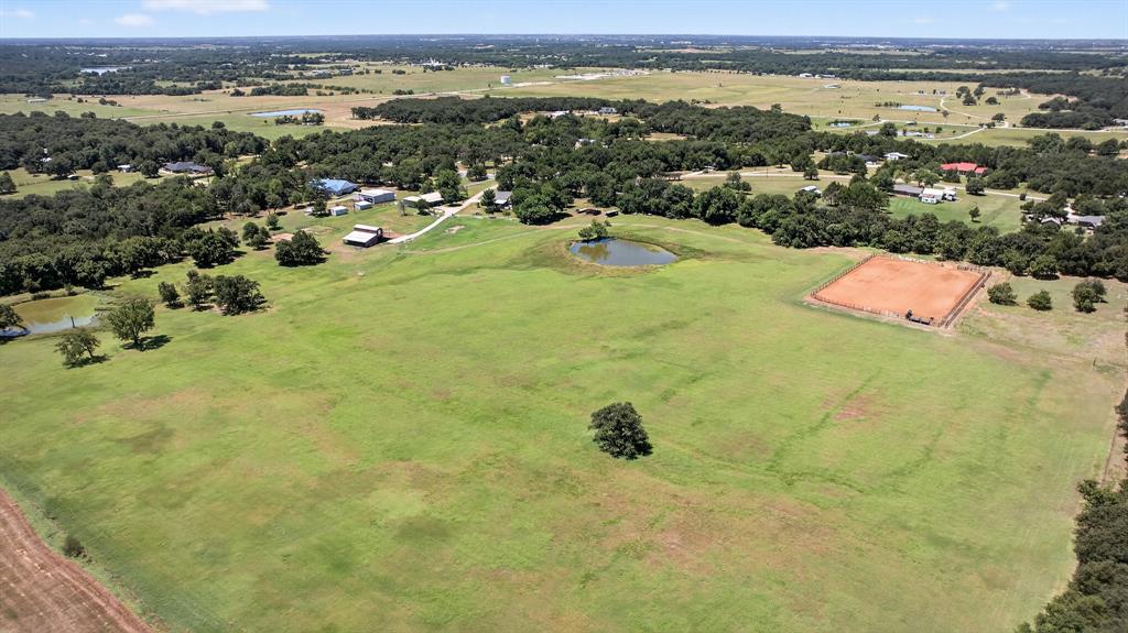 482 Center Hill Road Gainesville, TX 76240 - Photo 33 of 38 an aerial view of residential houses with outdoor space
