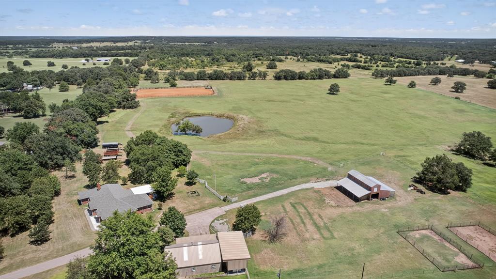 482 Center Hill Road Gainesville, TX 76240 - Photo 36 of 38 an aerial view of residential houses with outdoor space