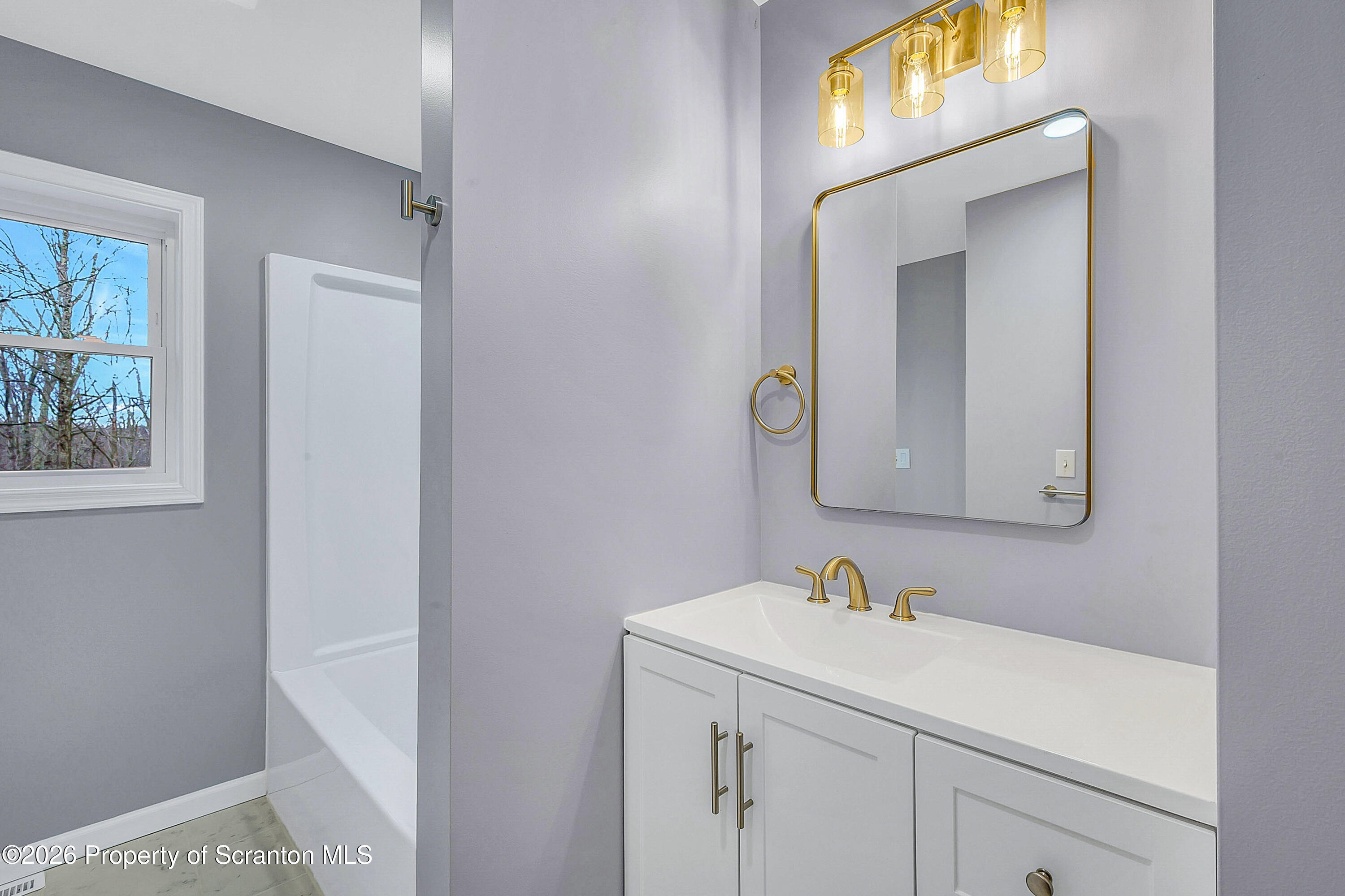 460 Newcomb Road Factoryville, PA 18419 - Photo 11 of 40 a utility room with a sink dryer and washer