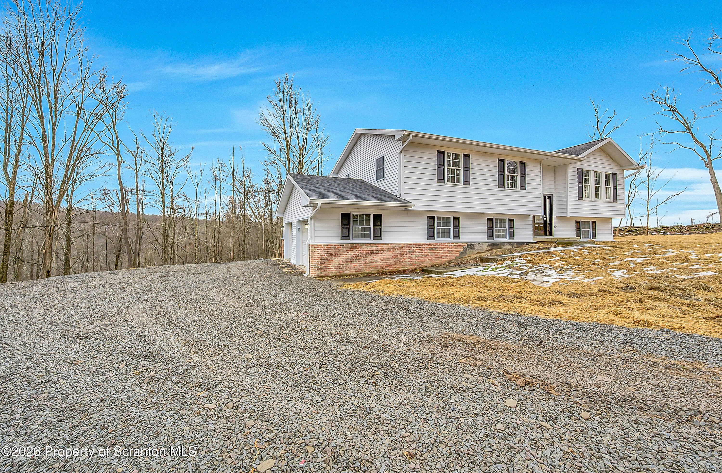 460 Newcomb Road Factoryville, PA 18419 - Photo 30 of 40 a house with swimming pool in front of it
