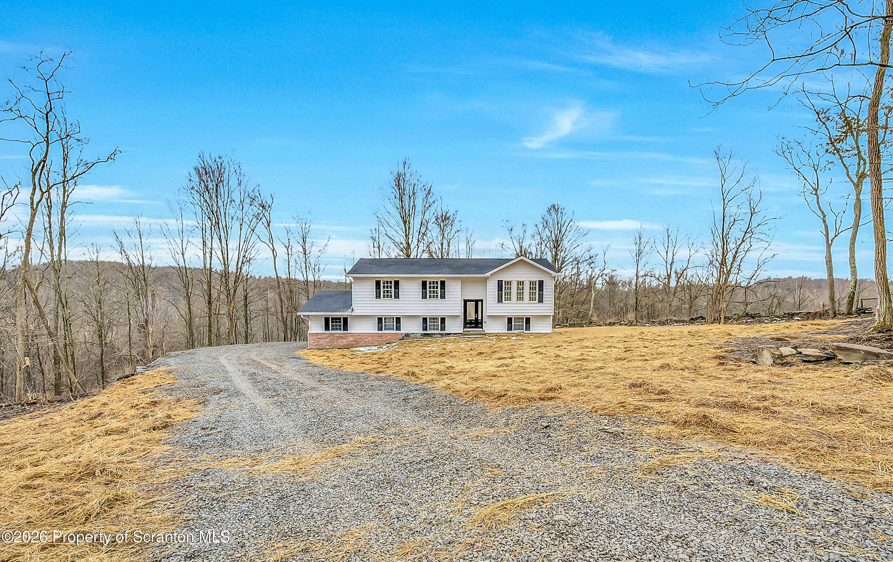 460 Newcomb Road Factoryville, PA 18419 - Photo 31 of 40 a front view of a house with a yard