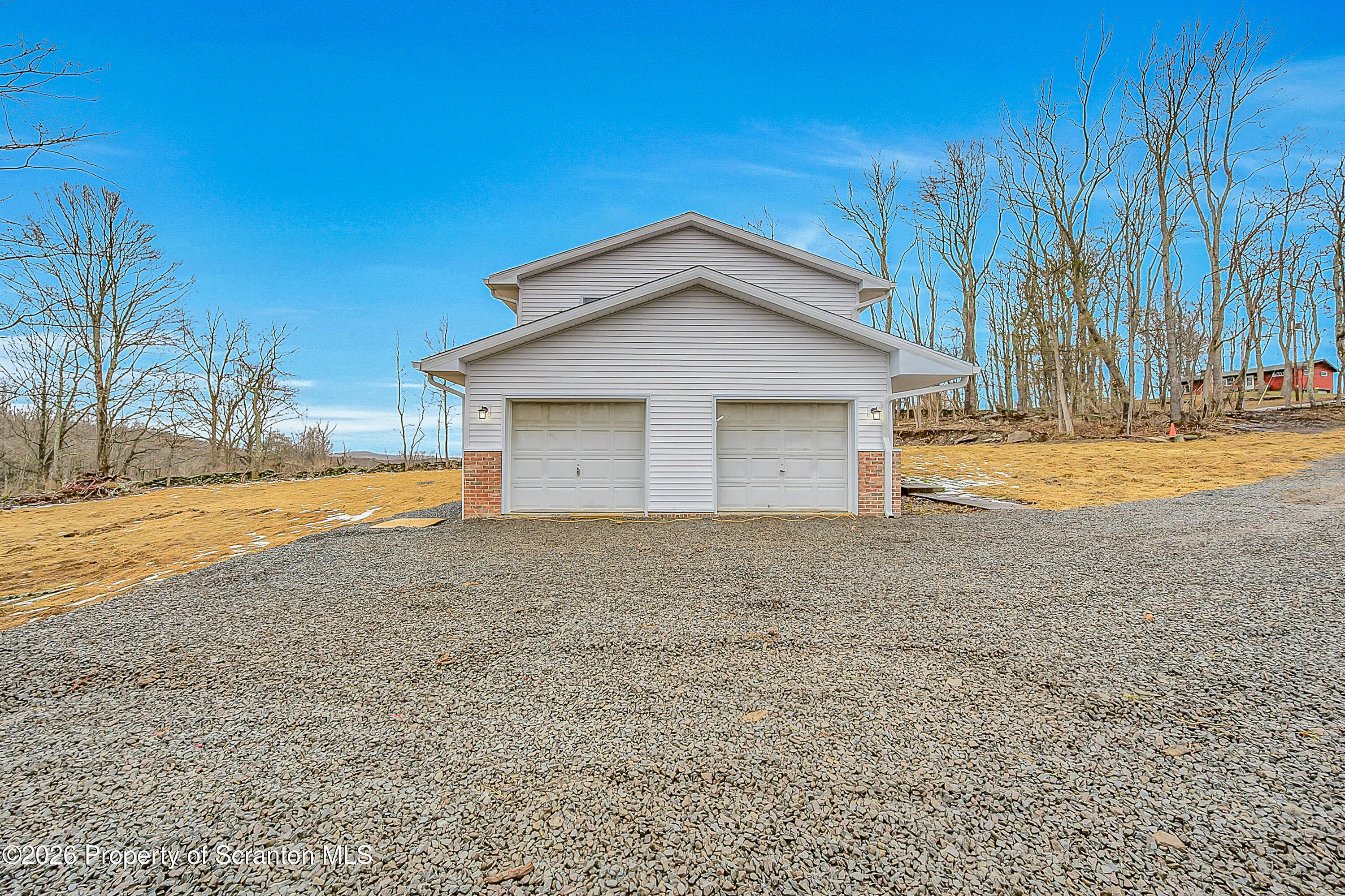 460 Newcomb Road Factoryville, PA 18419 - Photo 36 of 40 a view of a house with a yard and tree