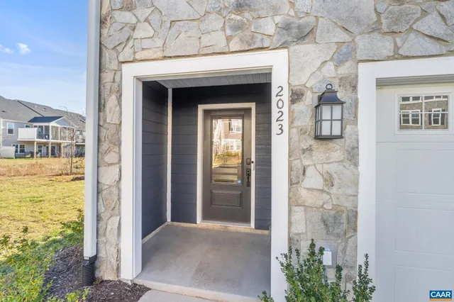 a view of a brick house with a door
