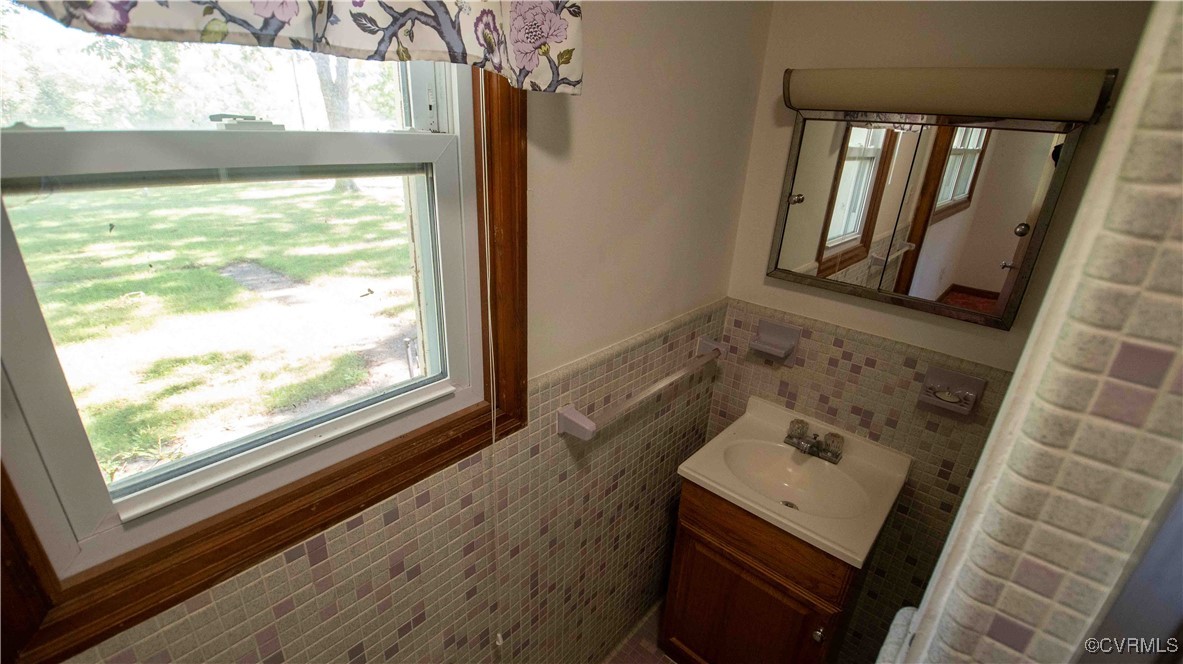 2600 Brunswick Road Blackstone, VA 23824 - Photo 35 of 35 Bathroom featuring tile walls and vanity